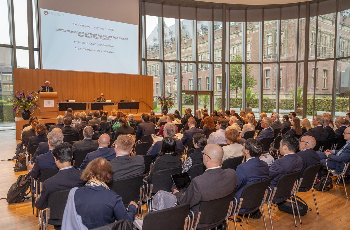 Professor Sir Christopher Greenwood delivering the keynote speech at the Peace Palace, The Hague