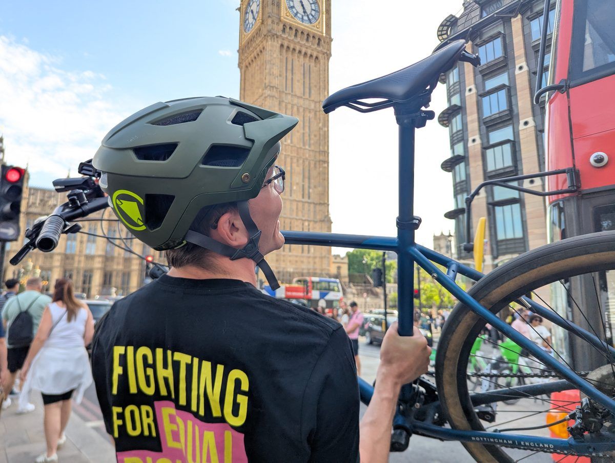 Callum Kroon training with his bike in front of Big Ben